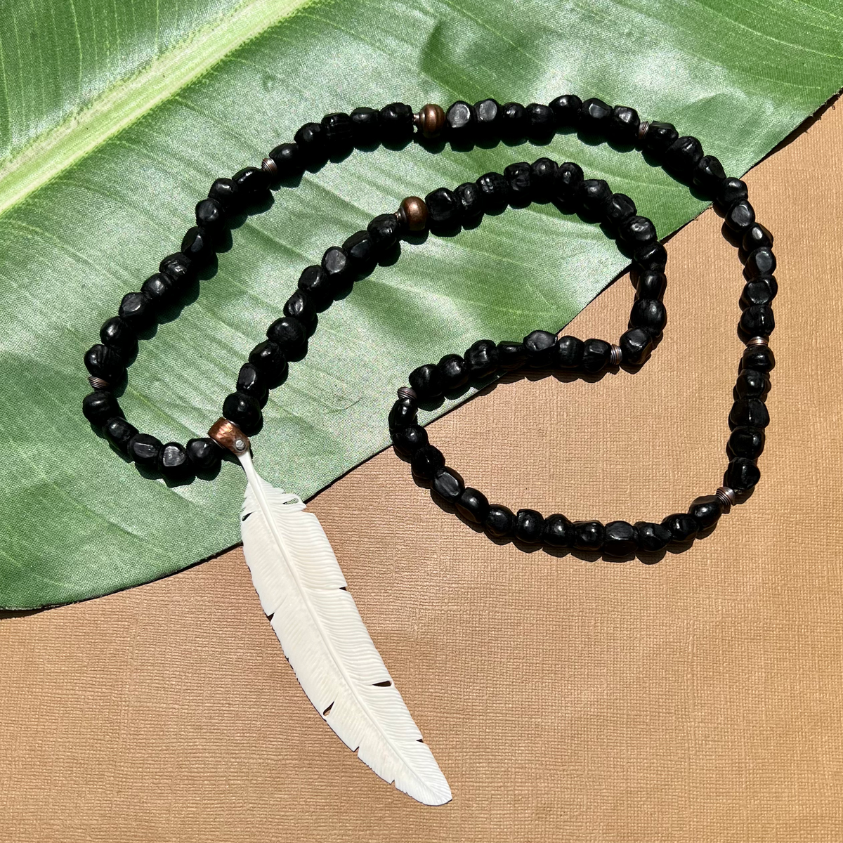 Banana Seed & Bone Feather Necklace