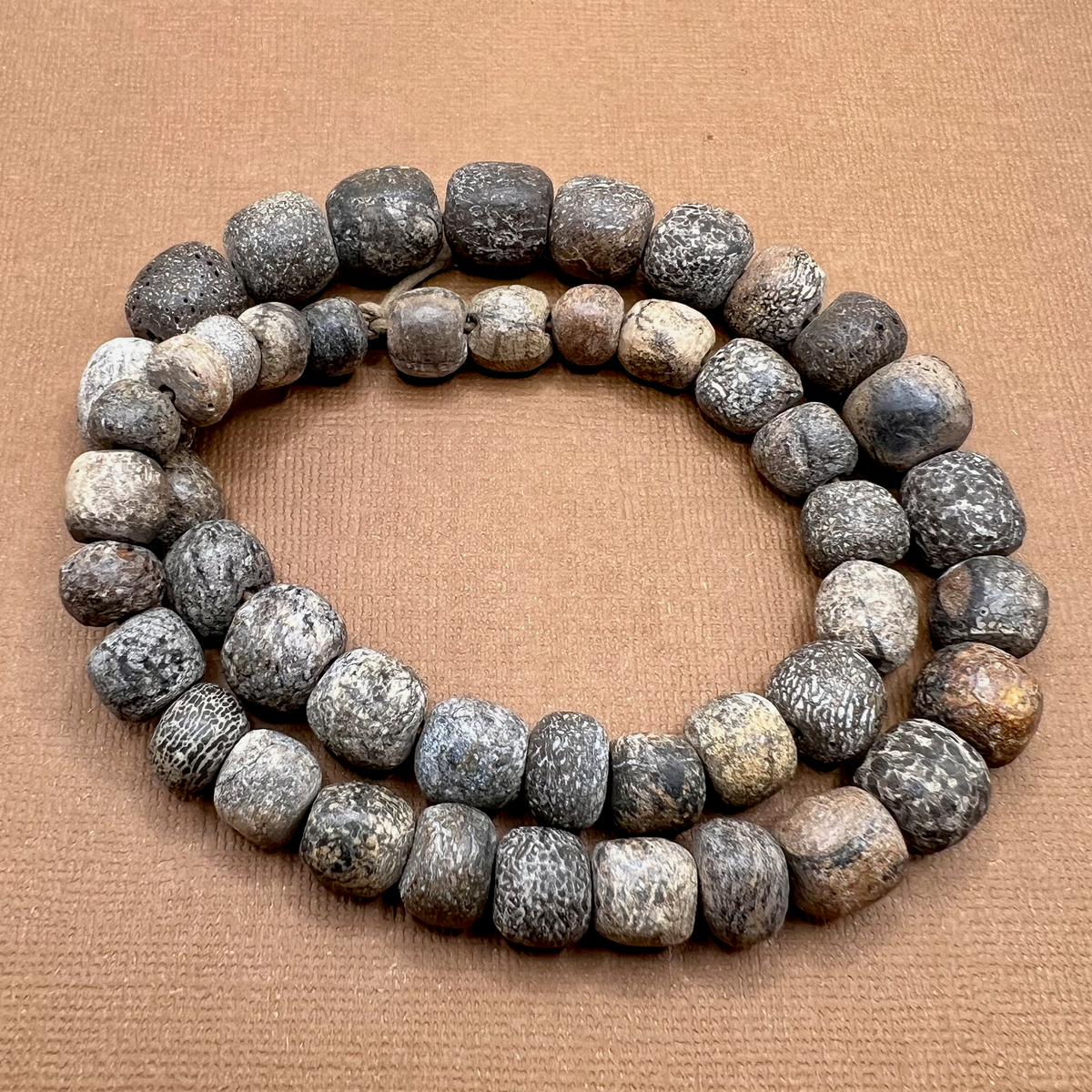 Strand Fossilized Stegodon Bone Beads