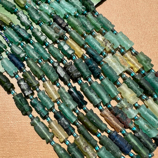 Roman Glass Carved Bead Strands