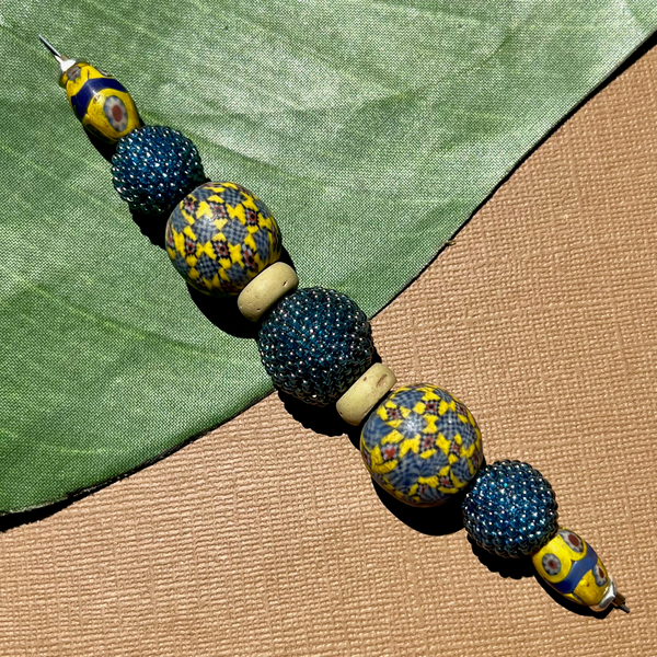 Blue and yellow Viking glass, sterling silver plated beads from Nepal.