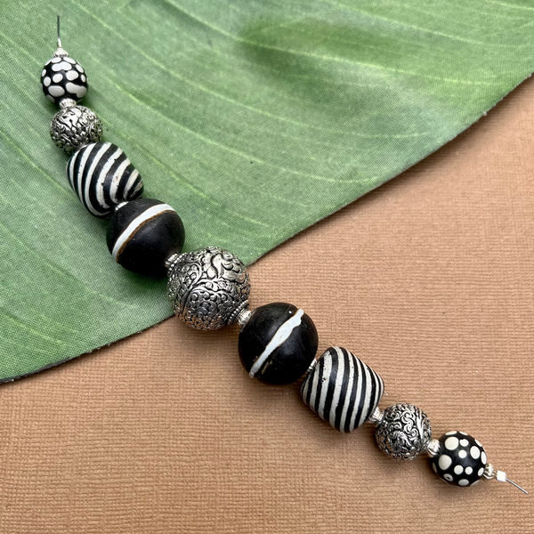 Black Glass and Carved Silver Strand -  9 Pieces
