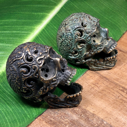 Small metal skulls