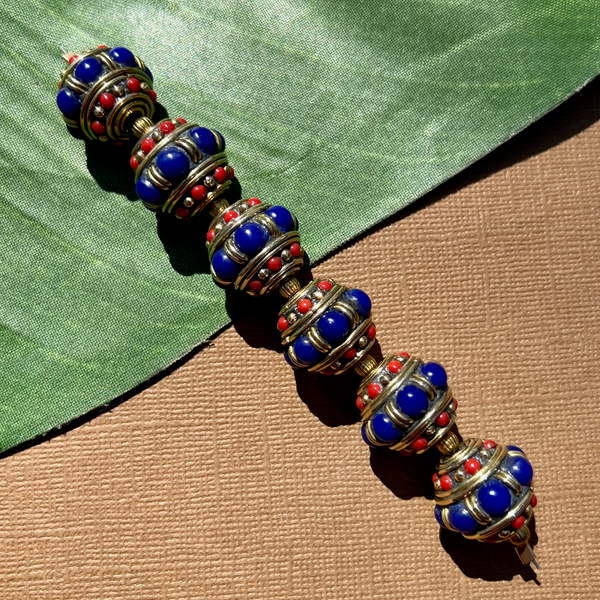 Tibetan brass and stone beads. Turquoise, lapis, coral decorative beads.