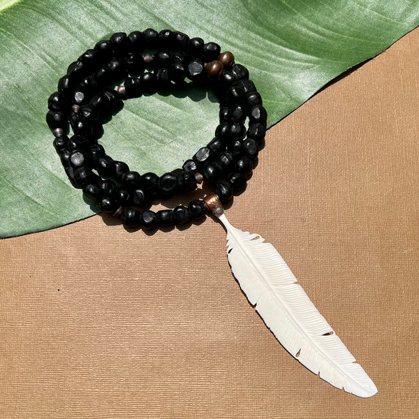 Banana Seed & Bone Feather Necklace