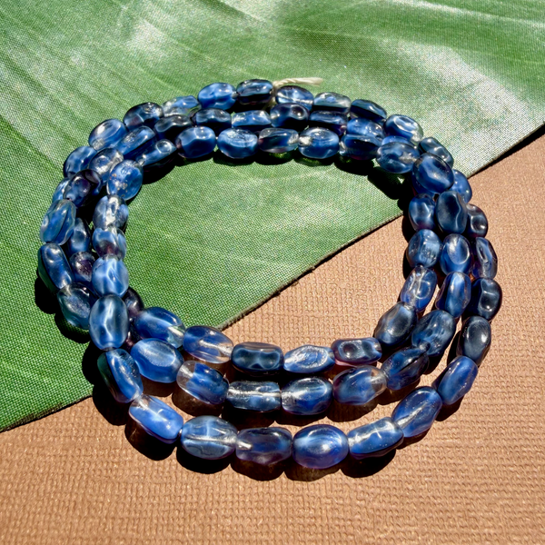 Dimpled Oval Blue Beads - 75 Pieces