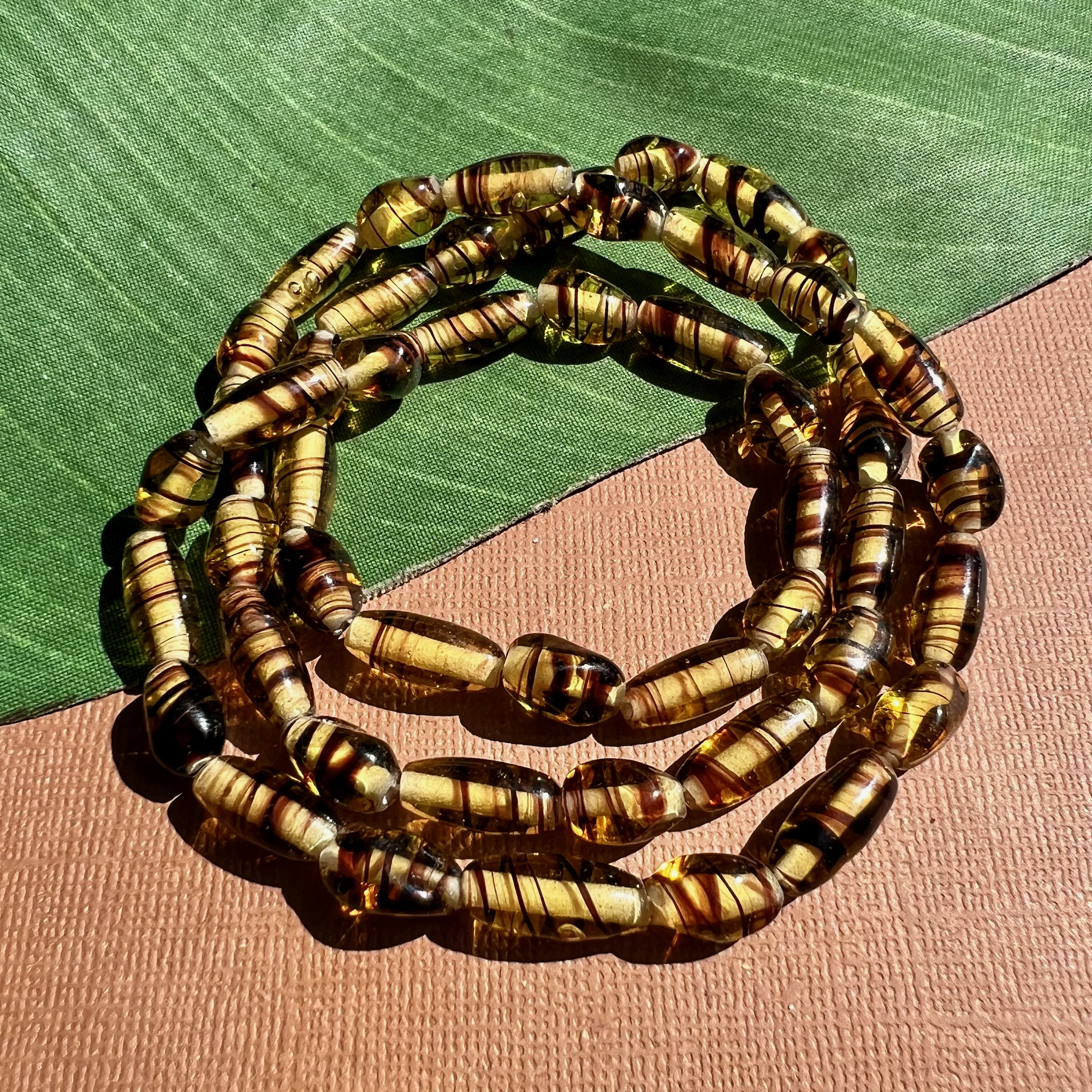 Amber Tone Glass Beads with Brown Stripes - 50 Pieces