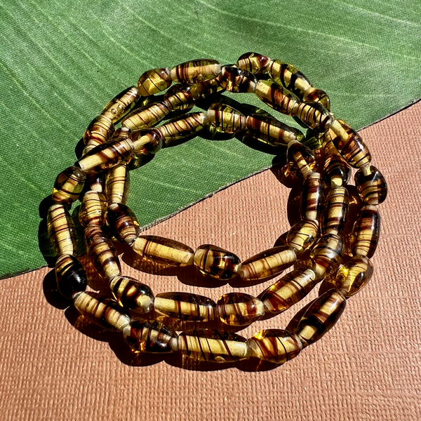 Amber Tone Glass Beads with Brown Stripes - 50 Pieces