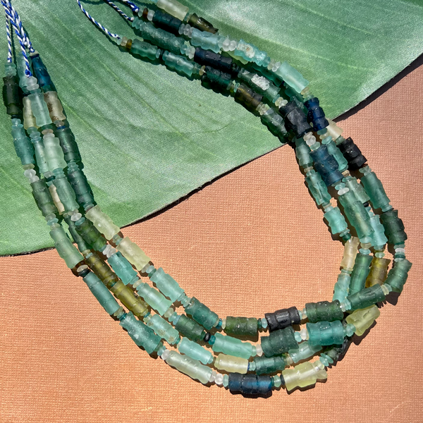 Roman Glass Carved Bead Strands