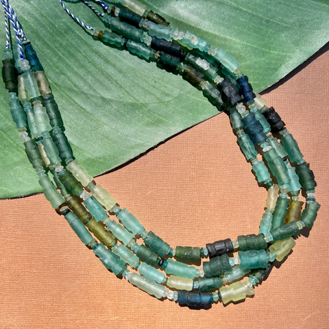 Roman Glass Carved Bead Strands