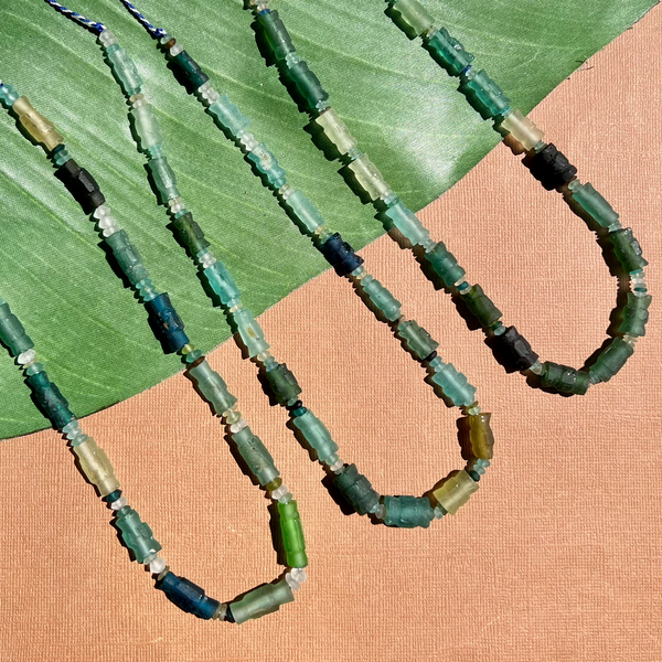Roman Glass Carved Bead Strands