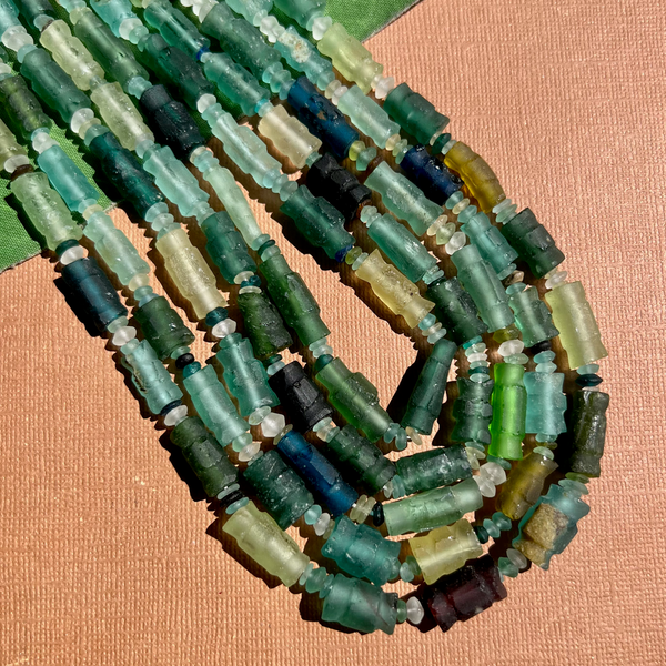 Roman Glass Carved Bead Strands