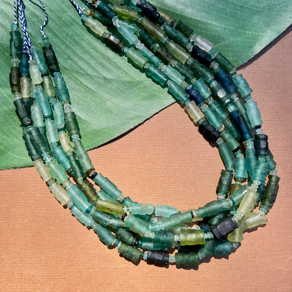 Roman Glass Carved Bead Strands