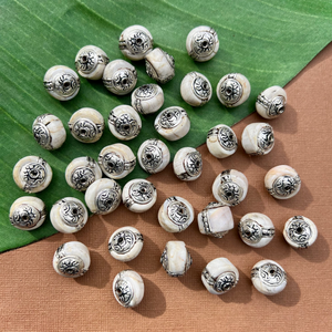 Conch & White Metal Wheel Beads