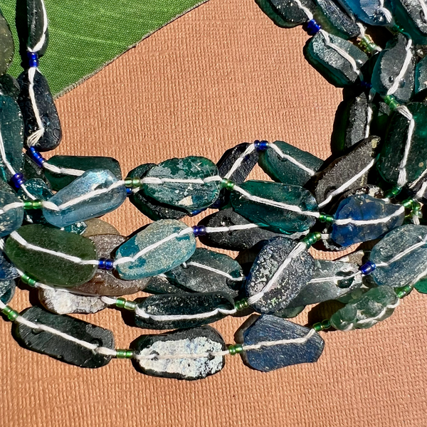 Roman Glass Flat Oval Bead Strands