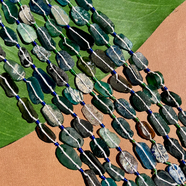 Roman Glass Flat Oval Bead Strands
