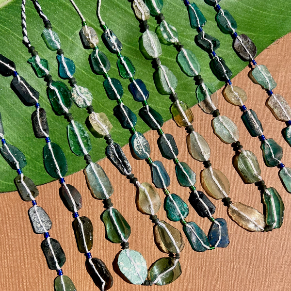 Roman Glass Flat Oval Bead Strands