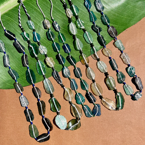 Roman Glass Flat Oval Bead Strands
