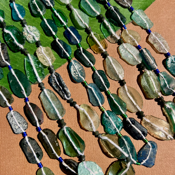 Roman Glass Flat Oval Bead Strands