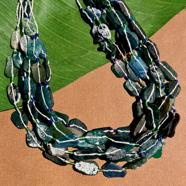 Roman Glass Flat Oval Bead Strands