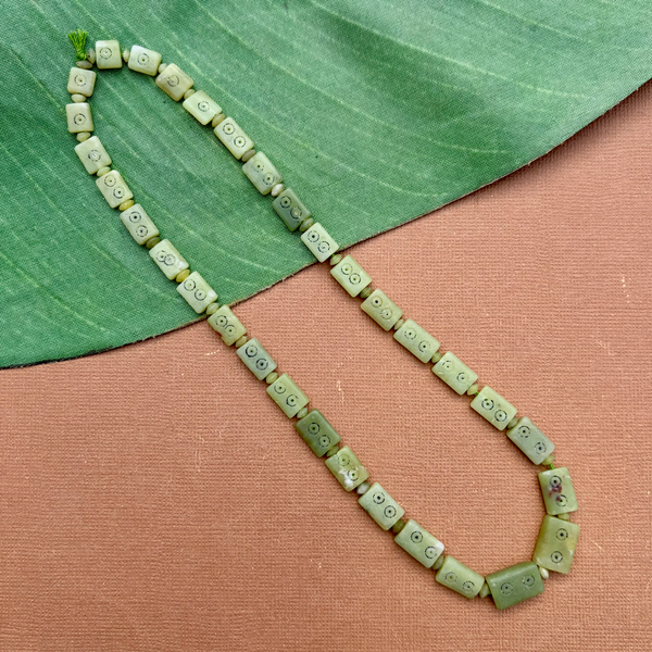 Carved Green Jade Graduated Strands - 1 Strand