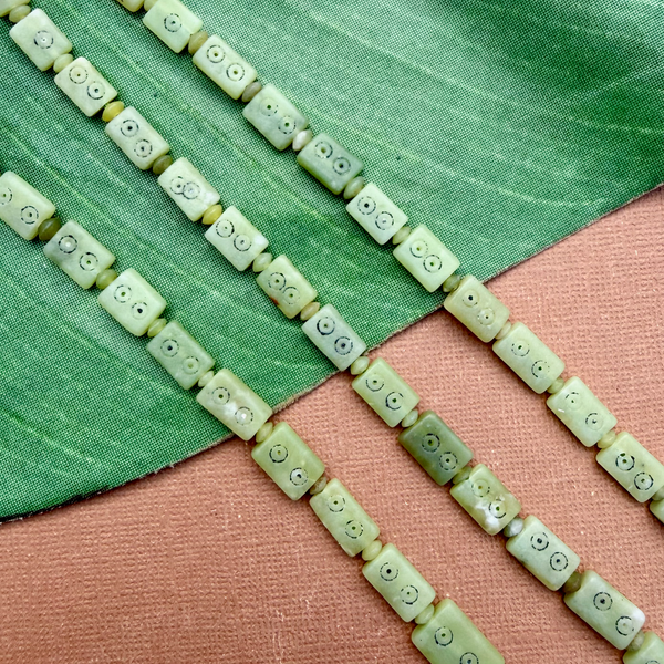 Carved Green Jade Graduated Strands - 1 Strand