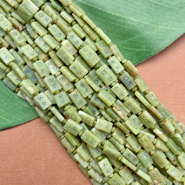 Carved Green Jade Graduated Strands - 1 Strand