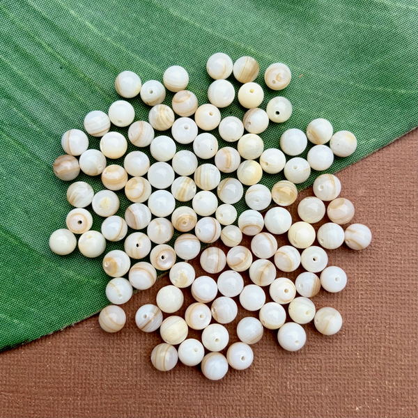 White Mother of Pearl 7mm Rounds - 200 pieces