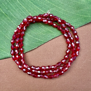 Red Faceted Oval Beads - 100 Pieces
