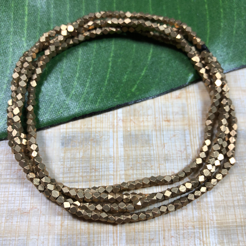 3mm cornerless cube beads. Brass beads from India. These beautiful brass beads make excellent spacers in a range of projects.