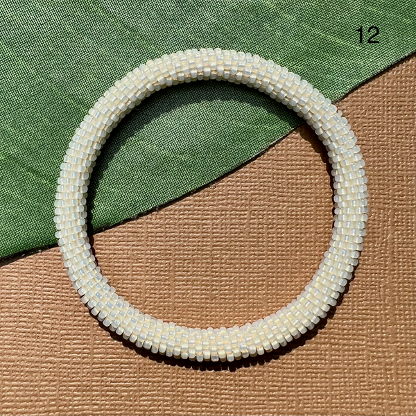 White with hint of gold seed bead bangle.