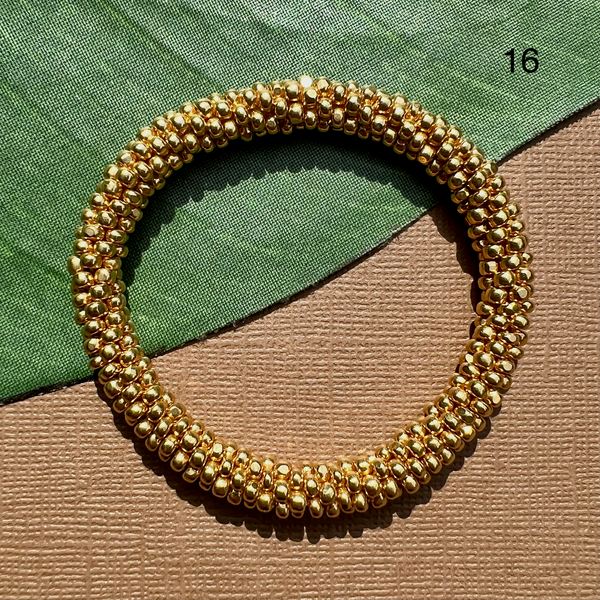 Gold size 8 seed bead charlotte cut beaded bangle bracelet.