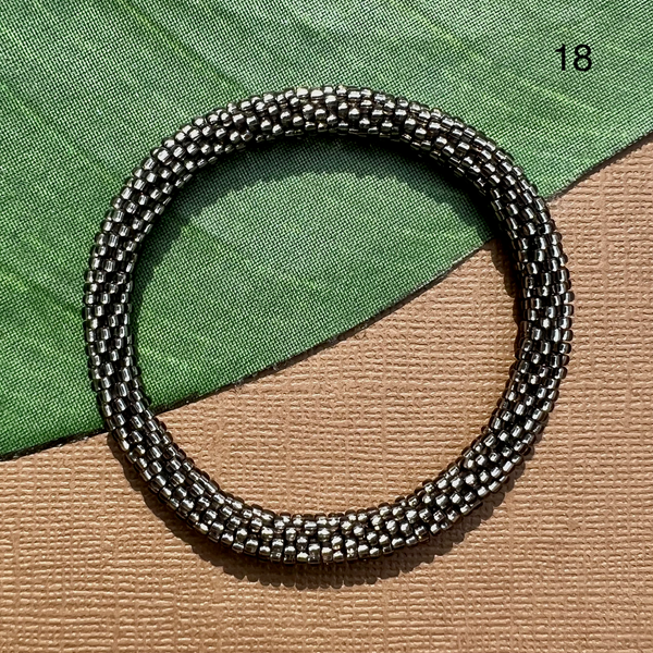 Neutral grayish brown seed bead bangle bracelet.
