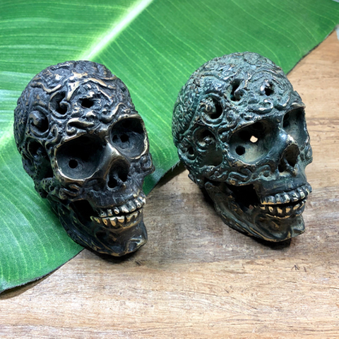Small metal skulls