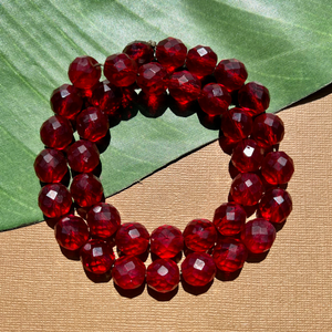 Shiny red faceted glass beads. Vintage red faceted beads.