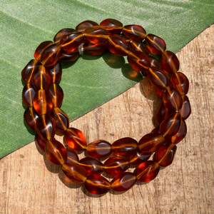 Amber Twisted Oval Beads - 50 Pieces
