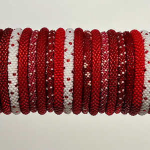 Candy apple beaded bangles. Shop our red beaded bangles of crocheted glass seed beads. Beaded bangles can be rolled on - fit most.