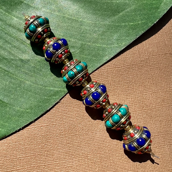Tibetan brass and stone beads. Turquoise, lapis, coral decorative beads.