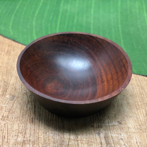 Small round wooden bowl