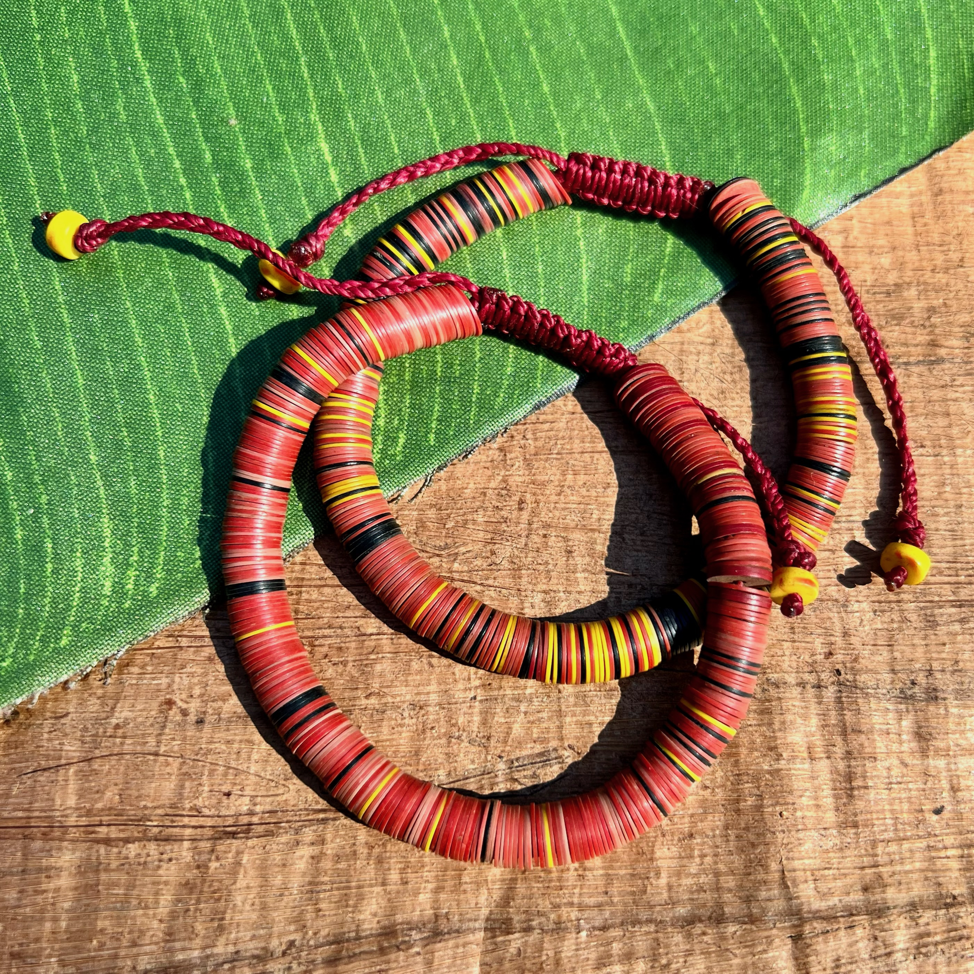 Red Yellow Black Vinyl Bracelets Medium Bead Goes On
