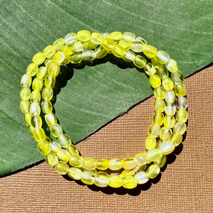 Small Yellow Tapered Oval Beads - 100 Pieces