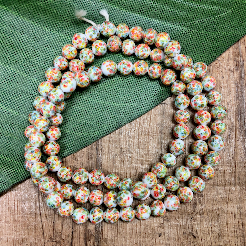 White, Orange, & Green Flower Tombo Beads - 50 Pieces